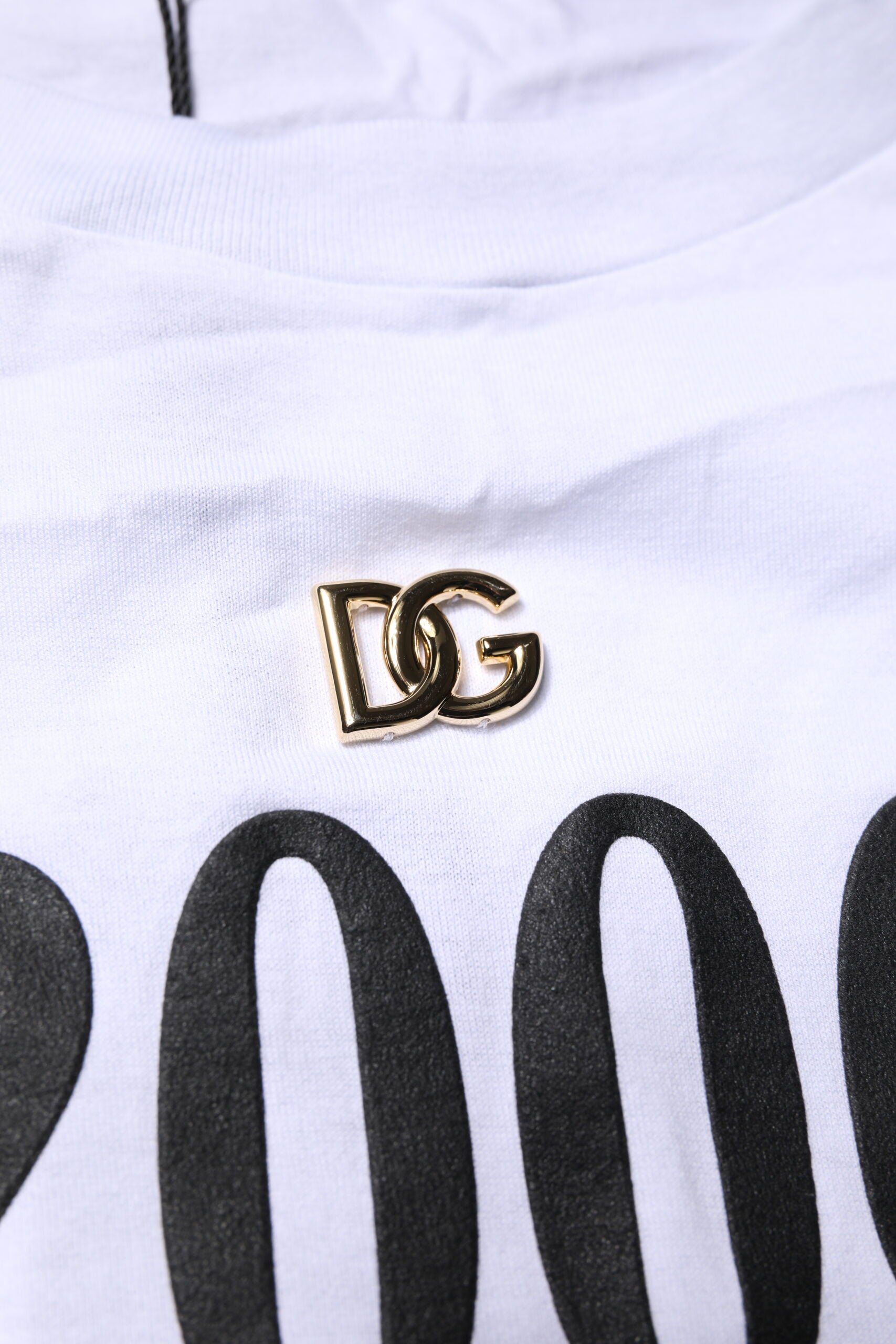 T-shirt blanc Dolce & Gabbana en coton avec imprimé, col rond et laçage, style décontracté et tendance.