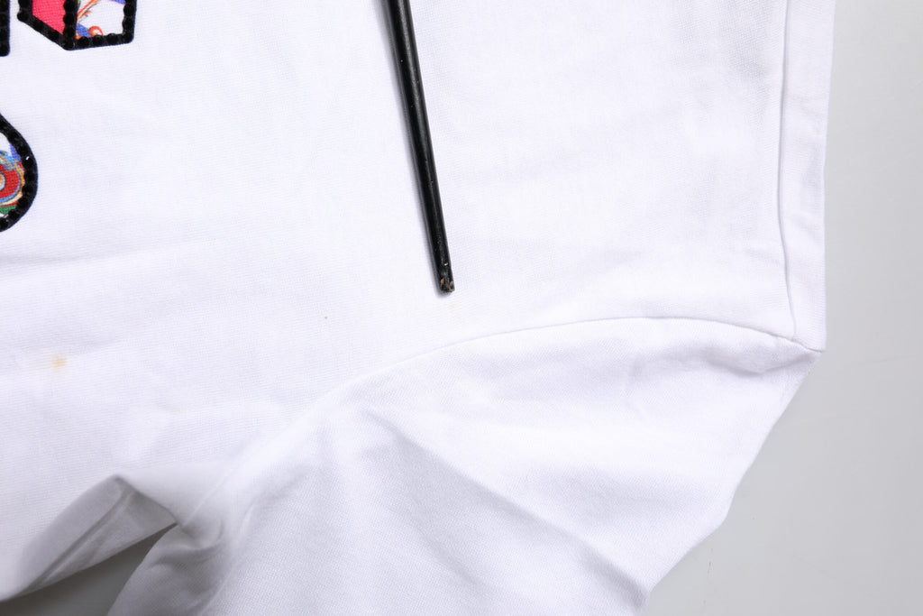 T-shirt Dolce & Gabbana en coton blanc avec logo imprimé, col rond, vue de face.