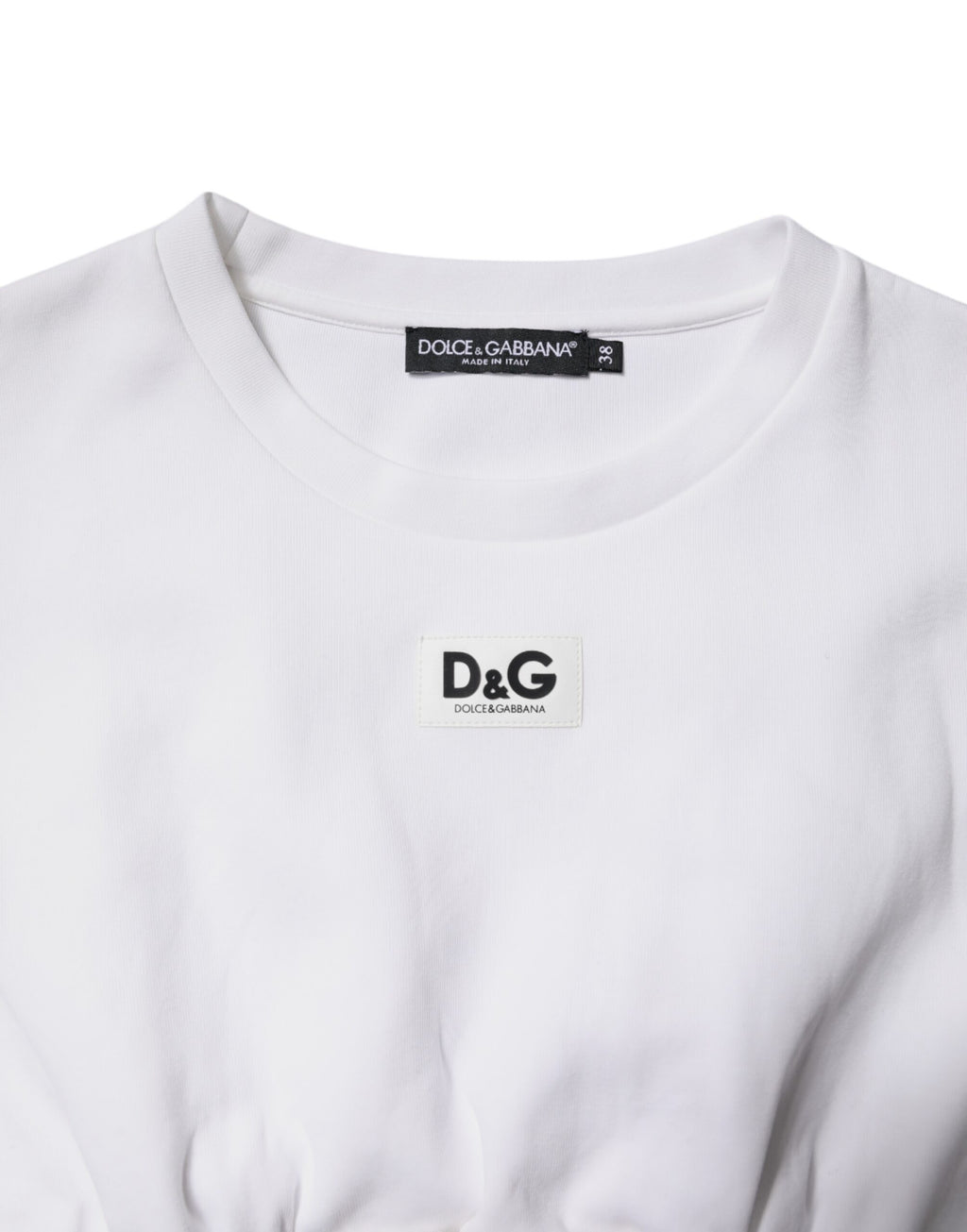 Chemisier blanc Dolce & Gabbana en coton mélangé à manches 3/4, détails élégants et coupe classique visible sur l'image.