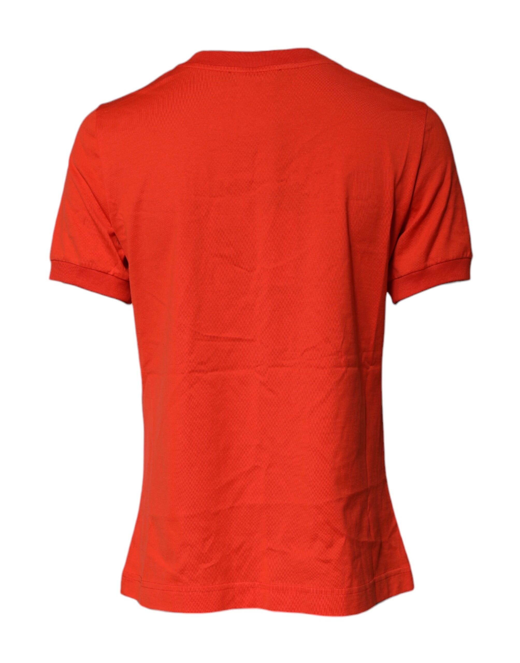 T-shirt en coton rouge Dolce & Gabbana avec broderie florale et col rond, vue de face.