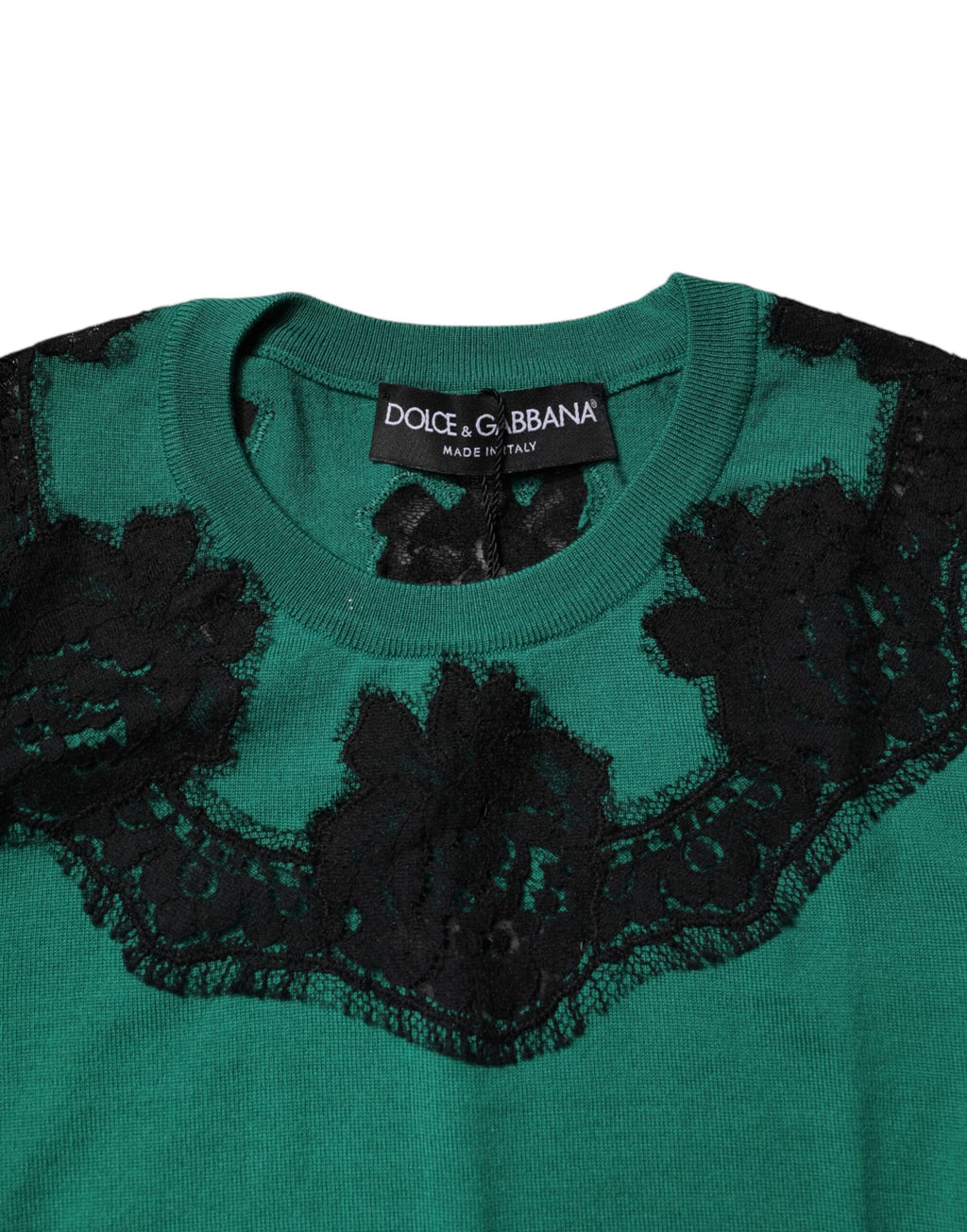 Débardeur sans manches en laine verte de Dolce & Gabbana avec détails en dentelle, élégant et tendance.