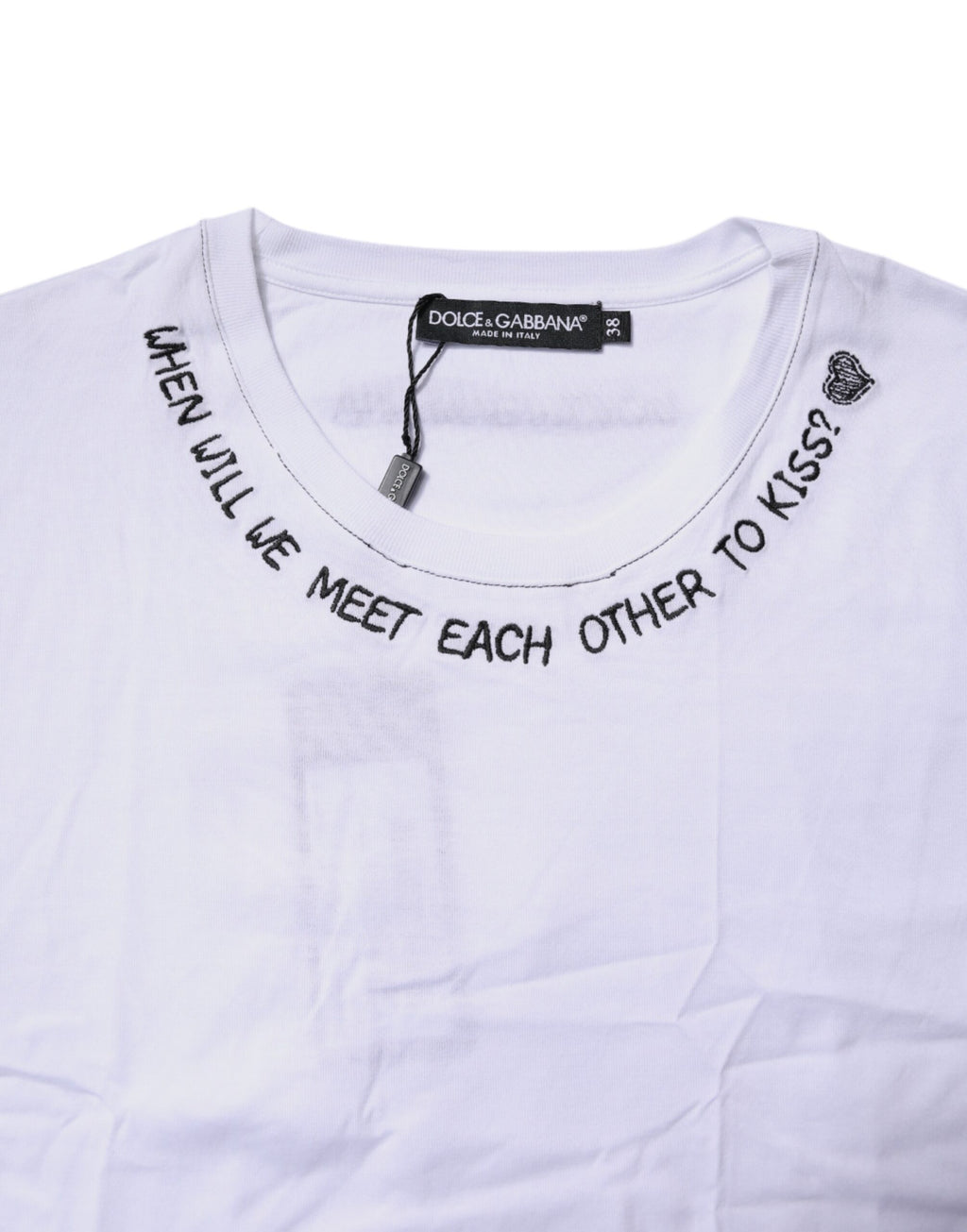 T-shirt sans manches Dolce & Gabbana en coton blanc avec imprimé floral, style décontracté et élégant.