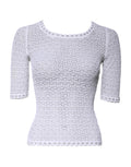Top court en viscose blanc Dolce & Gabbana à manches courtes en crochet, détails élégants et finition raffinée visible.