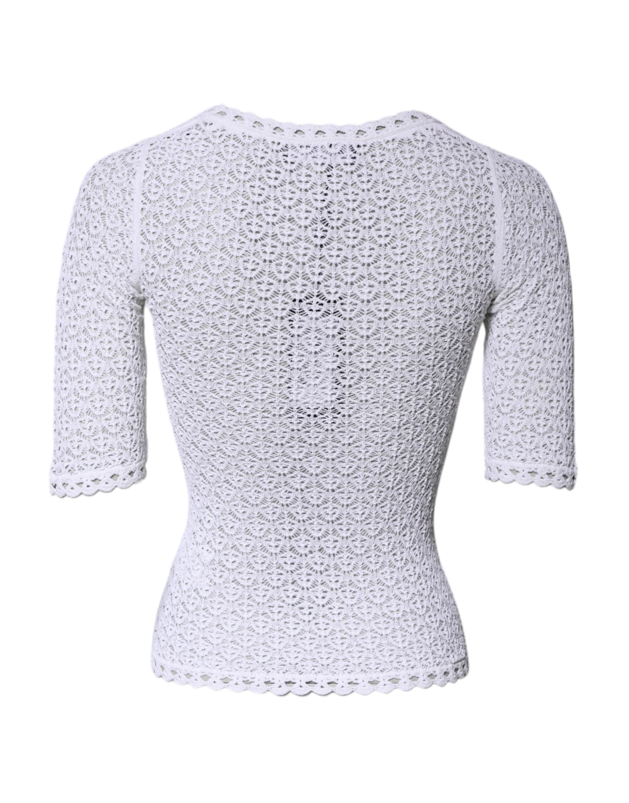 Haut court en viscose blanc Dolce & Gabbana avec manches courtes en crochet, détail élégant et tissu léger.