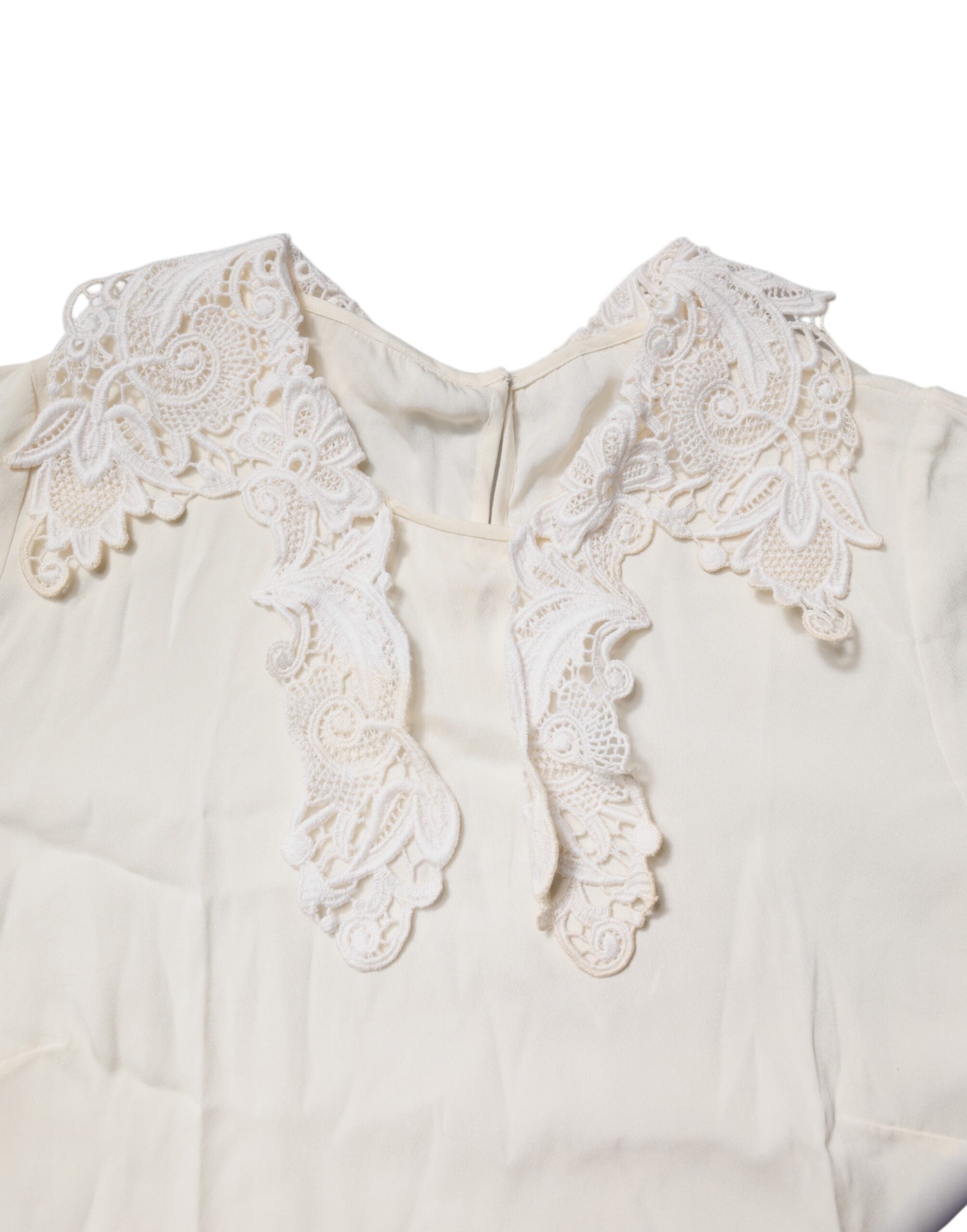 Blouse Dolce & Gabbana en dentelle florale crème à manches longues, élégante et raffinée pour femmes.
