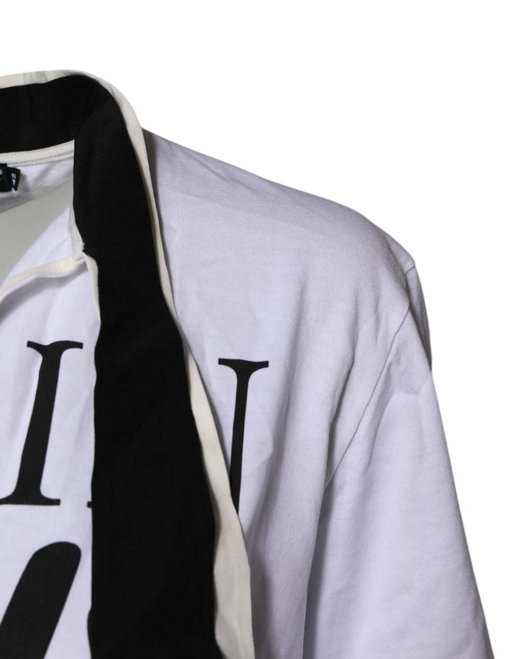 T-shirt blanc Dolce & Gabbana en coton et soie avec col ascot, élégant et doux, visible en gros plan.