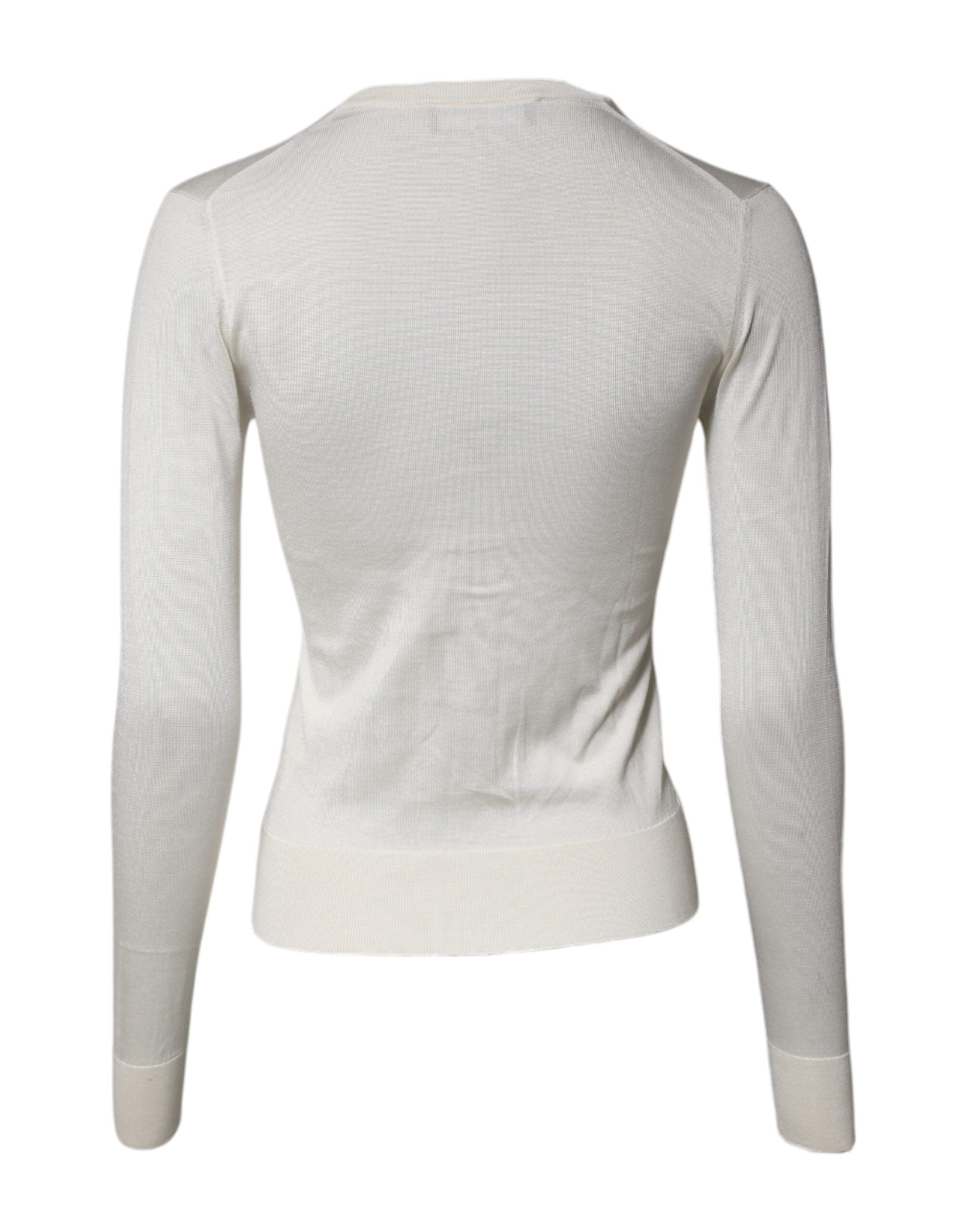 Cardigan en soie crème à fleurs avec embellissements Dolce & Gabbana, détail floral et design élégant.