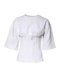Chemise Dolce & Gabbana en coton blanc à manches 3/4, vue de face, détails du tissu et coupe élégante visibles.