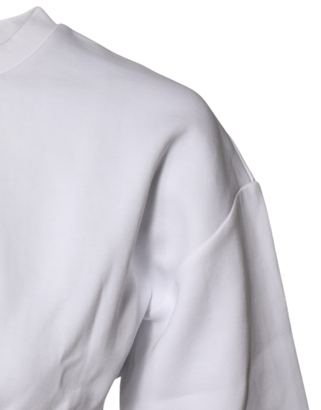 Chemisier Dolce & Gabbana en coton blanc à manches 3/4, style élégant et décontracté, visible avec détails de tissu.