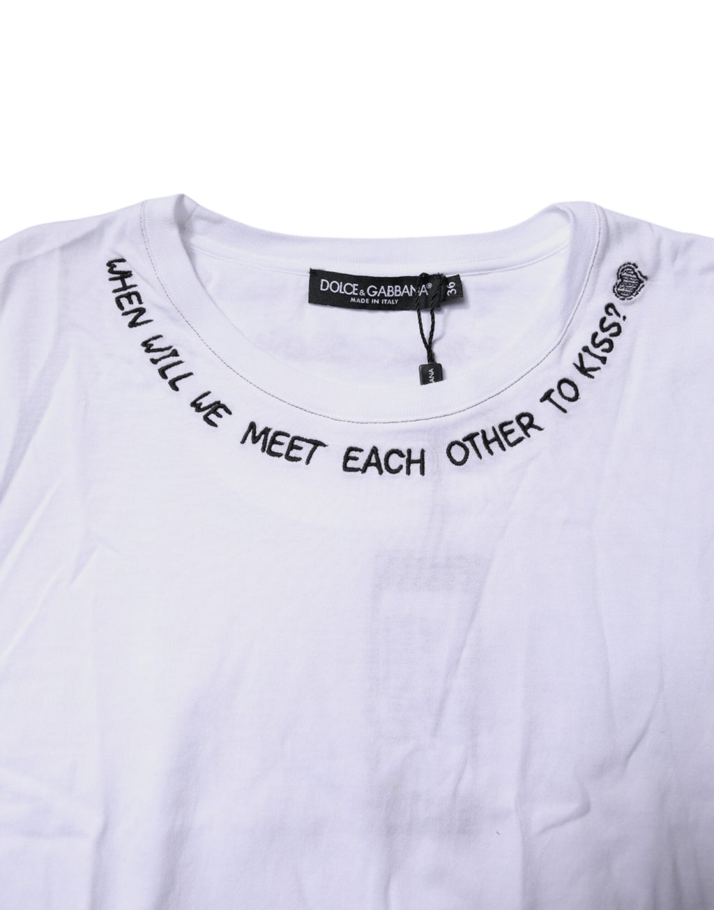 T-shirt sans manches Dolce & Gabbana en coton blanc avec imprimé floral, style décontracté et élégant, avec logo visible.