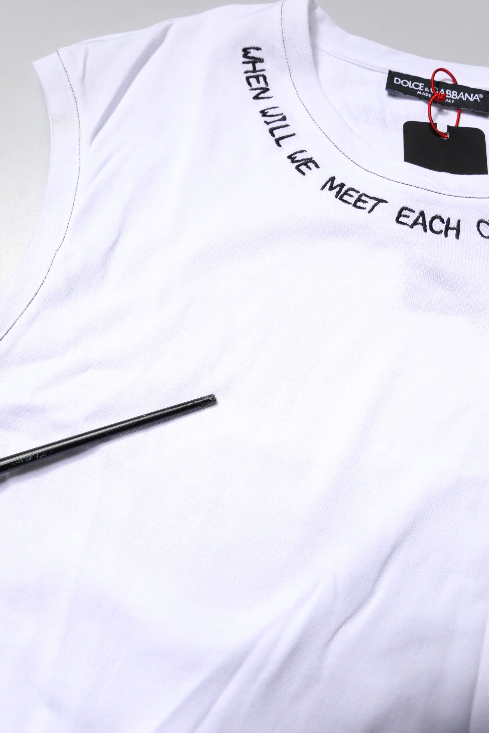 T-shirt sans manches blanc en coton Dolce & Gabbana avec imprimé floral, décontracté et élégant, pour un style estival.