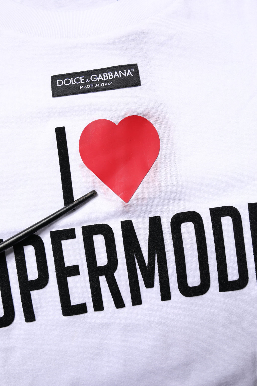 T-shirt blanc imprimé Dolce & Gabbana à col rond en coton, vue de face.