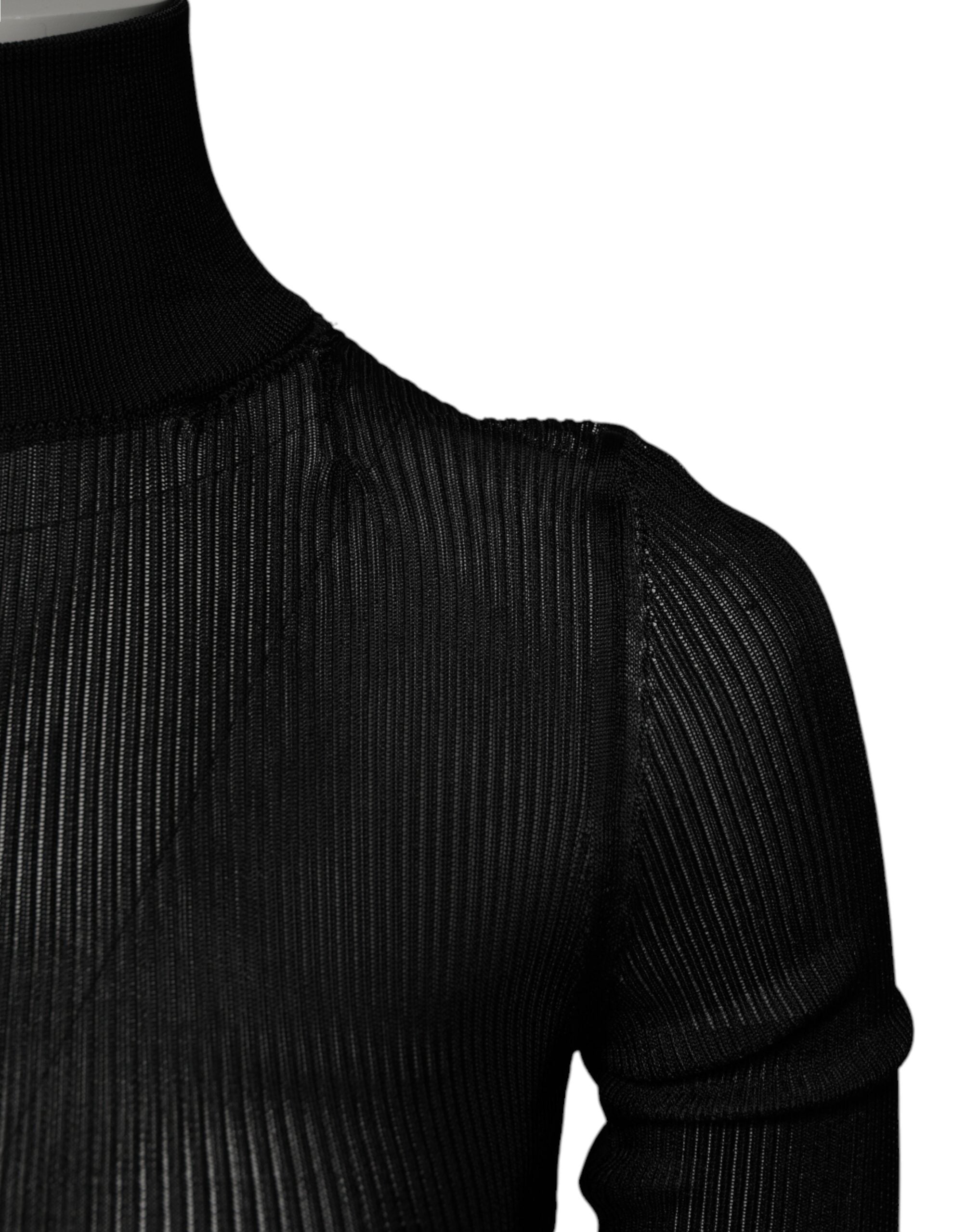 Pull à manches longues en tricot noir Dolce & Gabbana, col roulé slim, style élégant et ajusté.