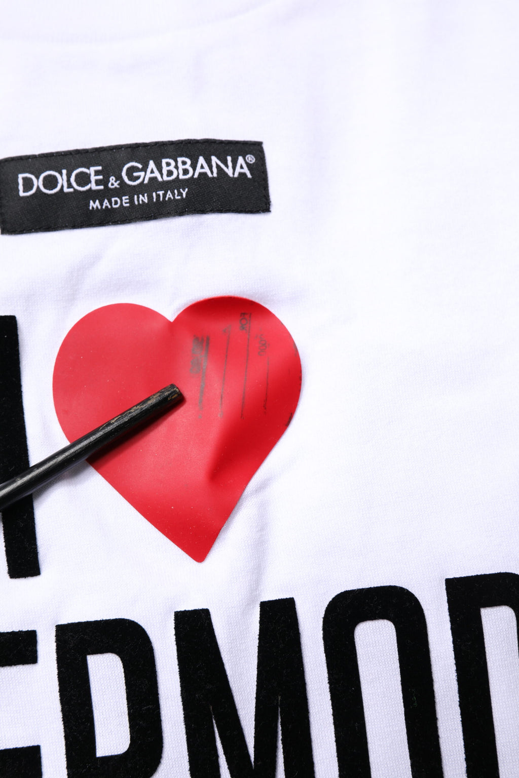 T-shirt blanc Dolce & Gabbana à col rond avec motif imprimé, en coton, vue de face.