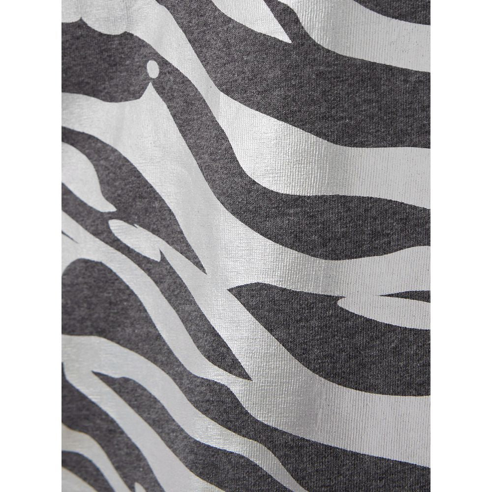 T-shirt en coton multicolore de la marque Kenzo, avec un design vibrant et élégant, visible en gros plan.