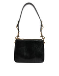 Sac à main pochette Dolce & Gabbana en cuir exotique noir avec bandoulière, élégant et sophistiqué.