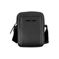Sac à épaule noir Calvin Klein avec logo discret, design élégant et fini lisse, idéal pour un style moderne et sophistiqué.