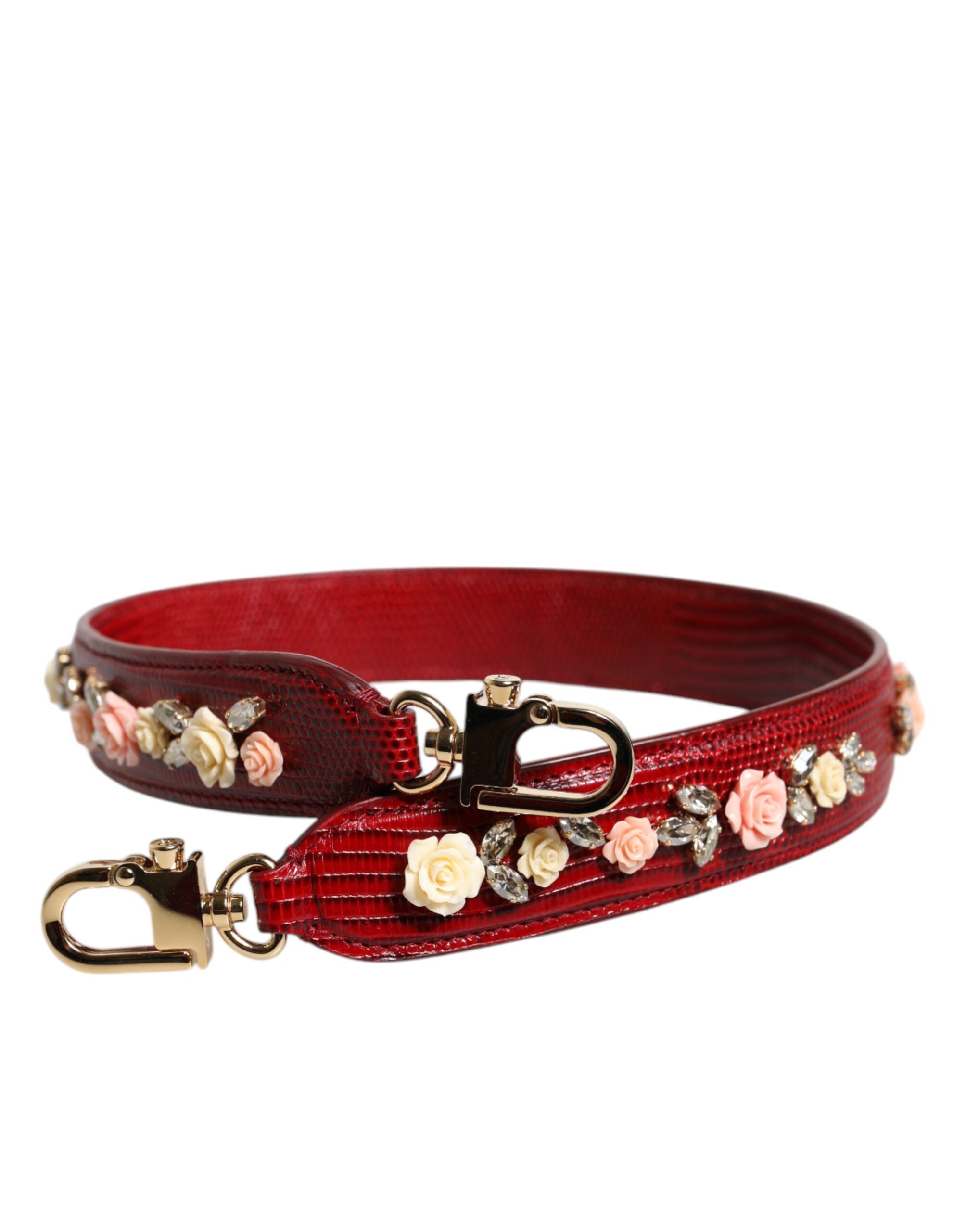 Sangle d'épaule en cuir rouge avec embellissements floraux pour sac Dolce & Gabbana, détails élégants visibles.