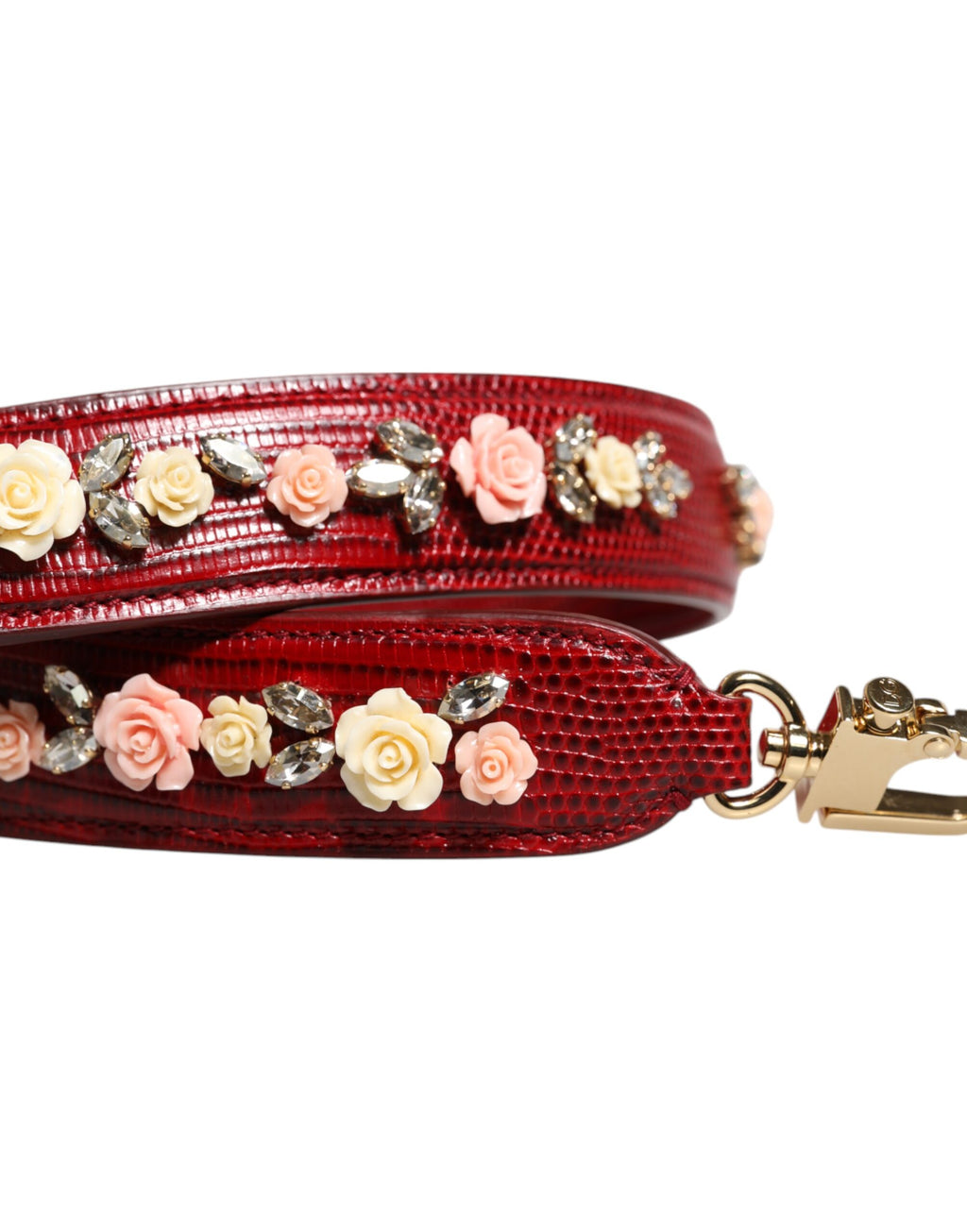 Sangle d'épaule en cuir rouge avec embellissements floraux pour sac Dolce & Gabbana, détail de la bandoulière élégante.