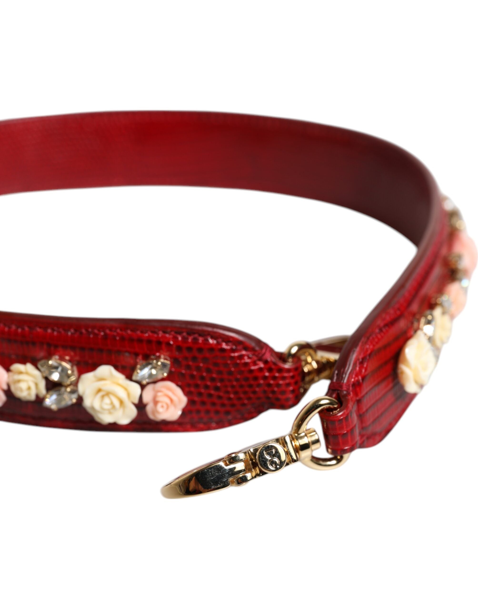 Sangle d'épaule pour sac en cuir rouge avec embellissements floraux Dolce & Gabbana, détails élégants et finition raffinée.