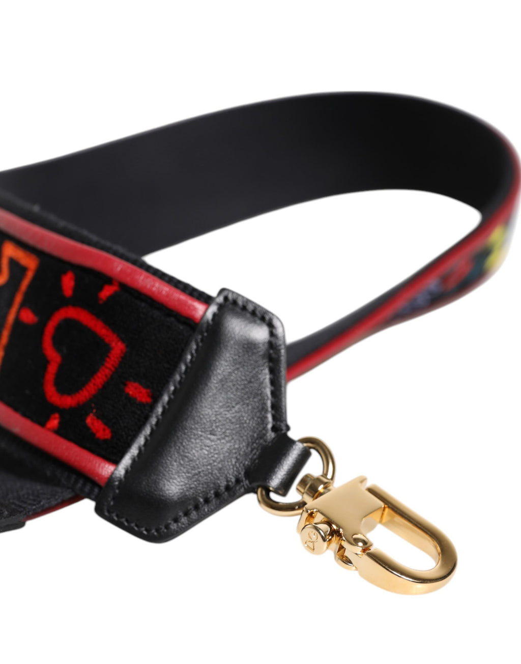Sangle d'épaule en coton noir avec imprimé Dolce & Gabbana pour sac, détail de la bandoulière de marque.