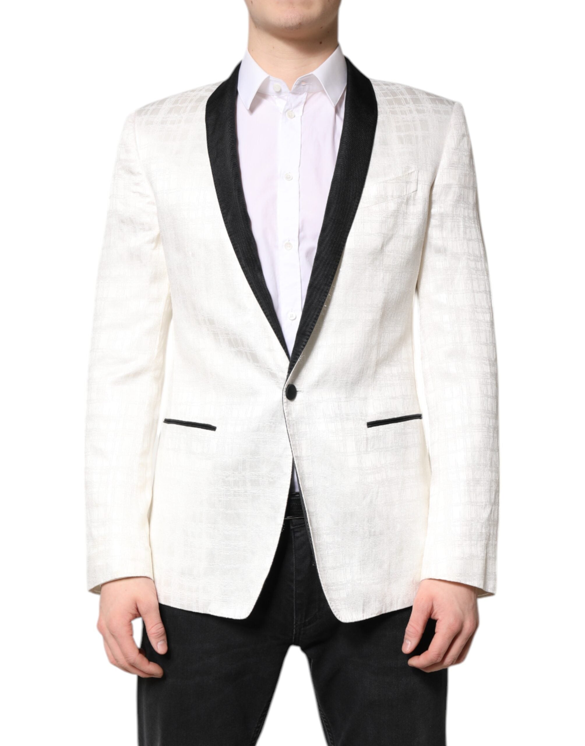 Manteau blazer blanc et noir Dolce & Gabbana à un seul boutonnage, élégant et moderne, porté sur un mannequin.