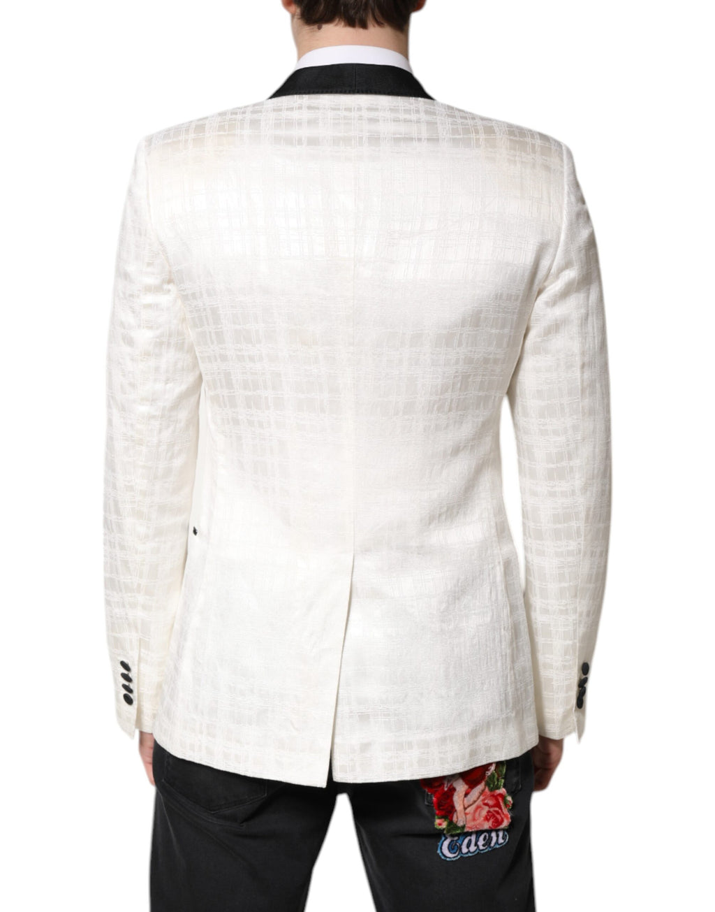 Manteau blazer Dolce & Gabbana blanc et noir à simple boutonnage, élégant et classique, porté sur un mannequin.