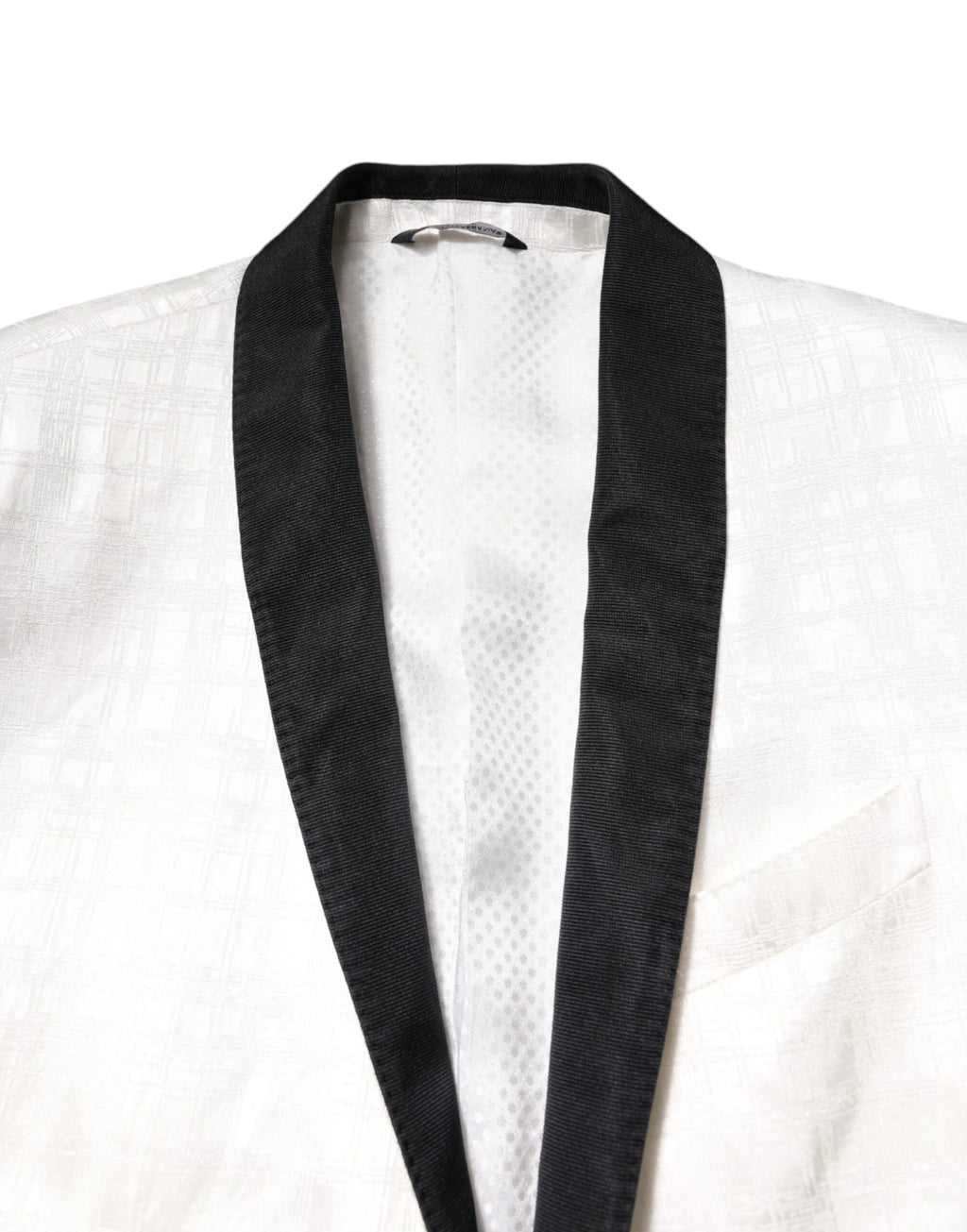 Manteau blazer blanc et noir Dolce & Gabbana à simple boutonnage, style élégant et chic, porté sur un mannequin.