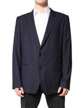 Manteau blazer noir en laine Dolce & Gabbana à boutonnière simple, vue de face sur fond neutre.