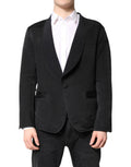 Manteau blazer noir en soie Dolce & Gabbana, coupe simple boutonnage devant, élégance classique et sophistiquée.