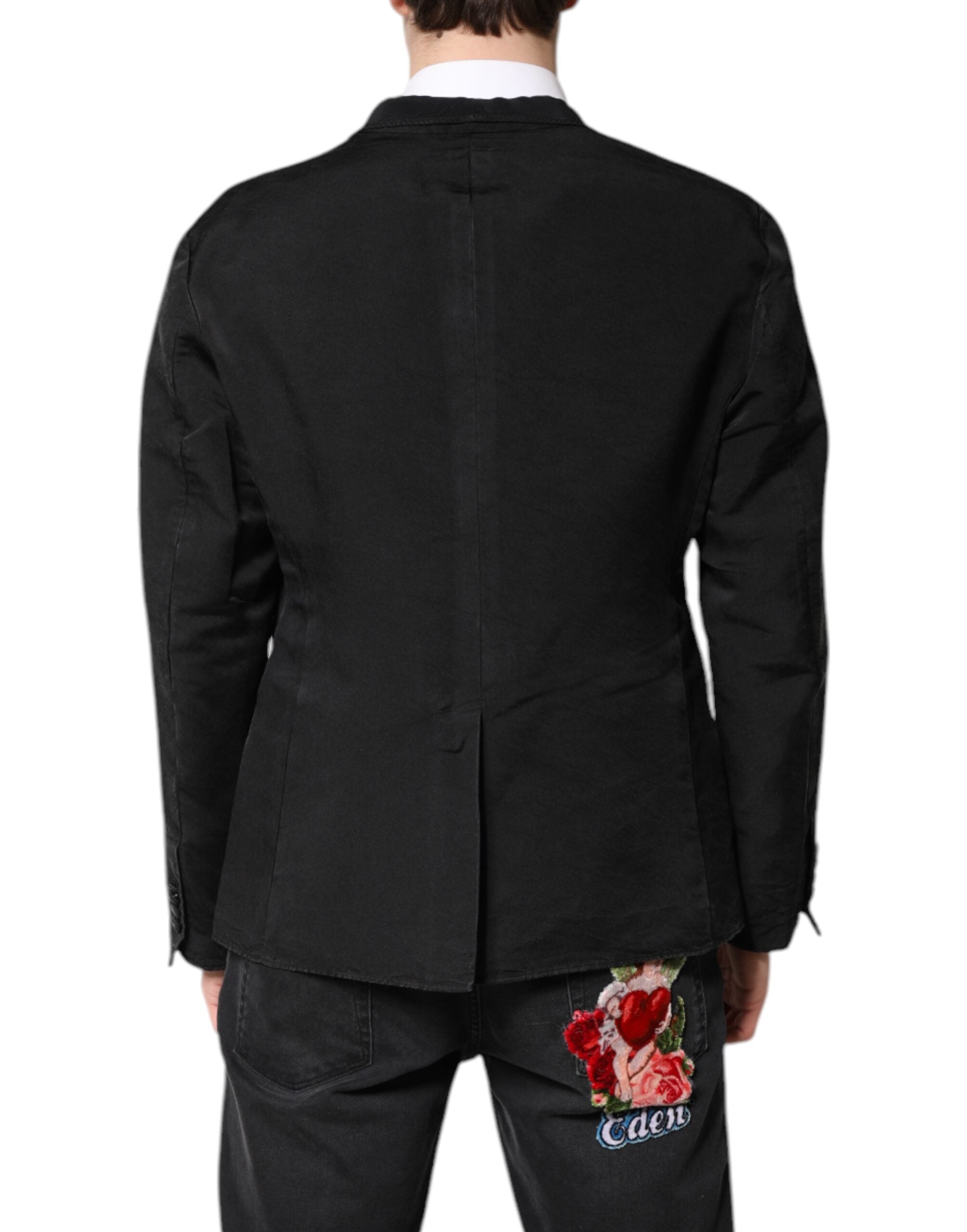 Blazer noir en soie Dolce & Gabbana, manteau à un bouton, coupe élégante et moderne, porté sur un mannequin.