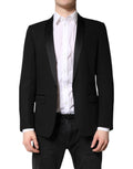 Manteau homme Dolce & Gabbana noir à un bouton, coupe blazer Martini avec col élégant, détail classique et tissu de qualité.