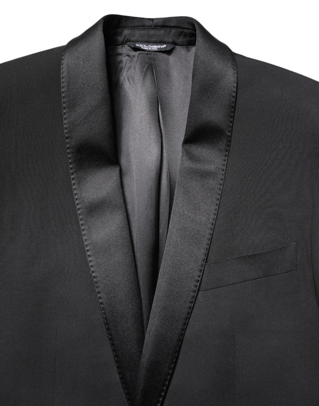 Manteau homme noir Dolce & Gabbana Martini blazer à un bouton, coupe classique, tissu élégant, porté sur un mannequin.