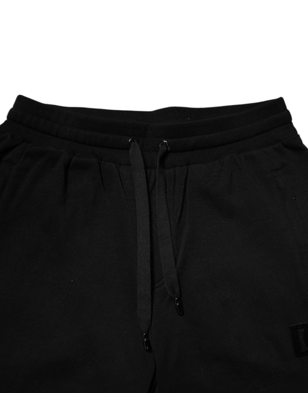 Pantalons de jogging Dolce & Gabbana en coton noir, taille mi-haute, style décontracté et confortable.