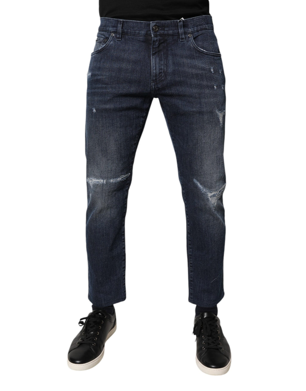 Jeans hommes Dolce & Gabbana en denim bleu en coton stretch, coupe skinny, affichés sur un fond neutre.