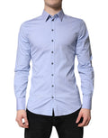 Chemise formelle en coton Light Blue Sicily de Dolce & Gabbana, style élégant avec col boutonné et manches longues.