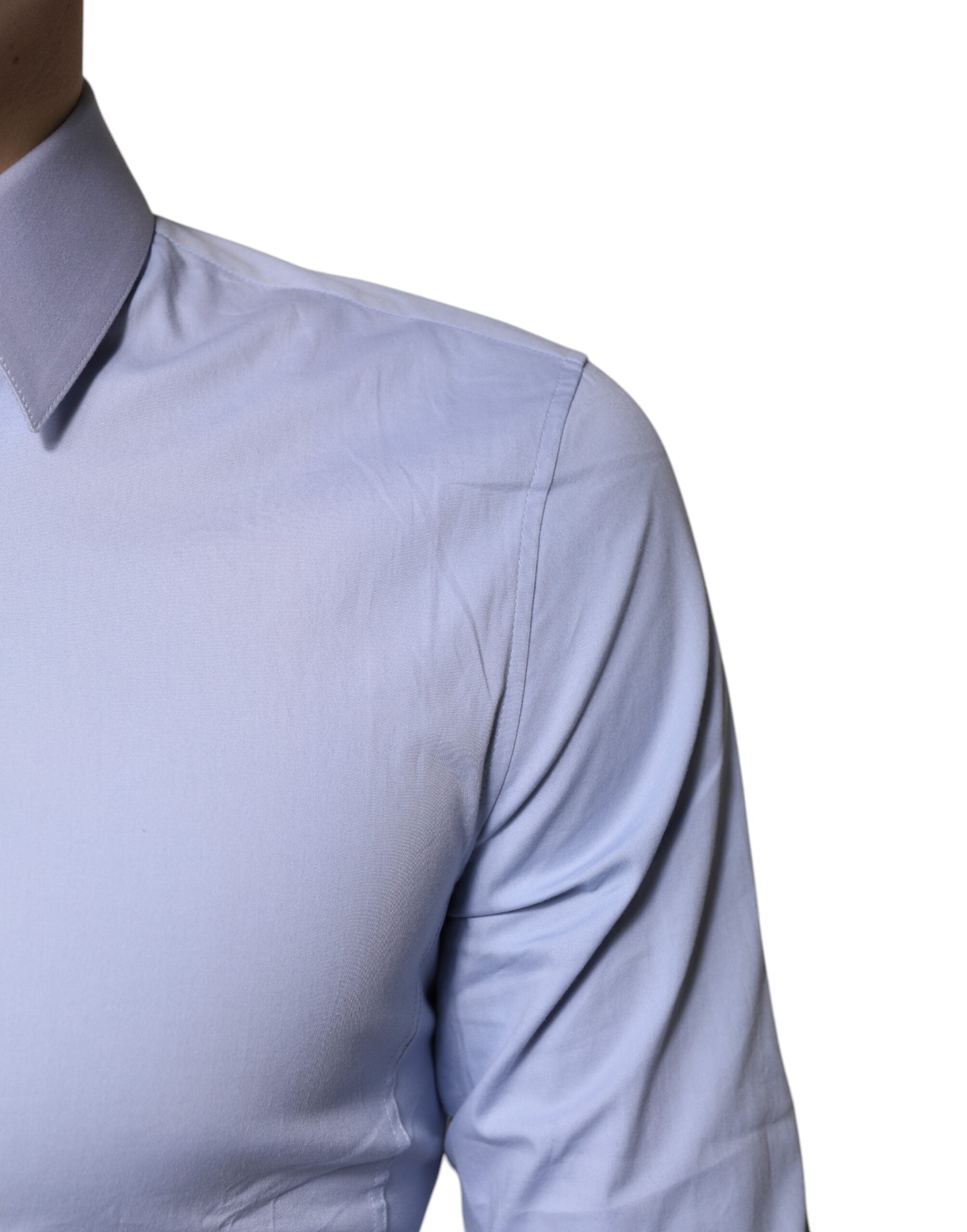 Chemise formelle Dolce & Gabbana Light Blue en coton Sicilia, élégante avec col classique et boutons visibles.