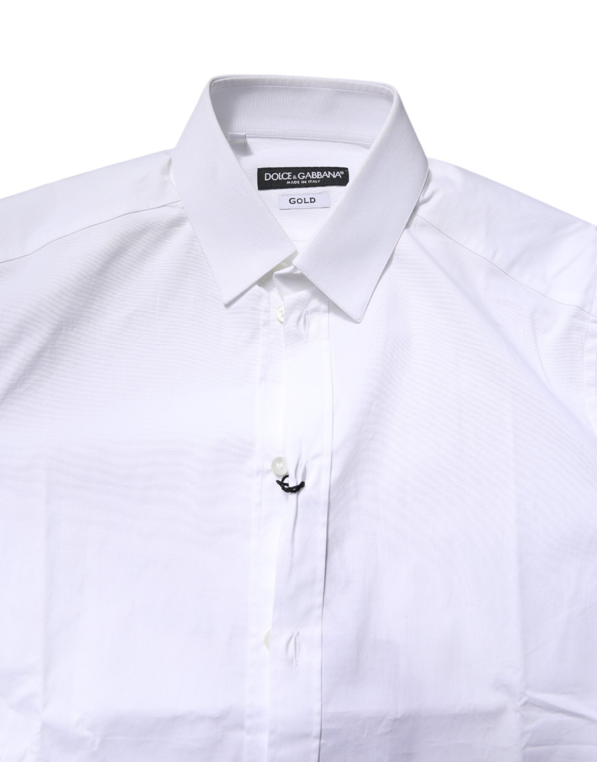 Chemise formelle blanche en coton stretch Dolce & Gabbana avec détails dorés, élégante et moderne pour occasions spéciales.