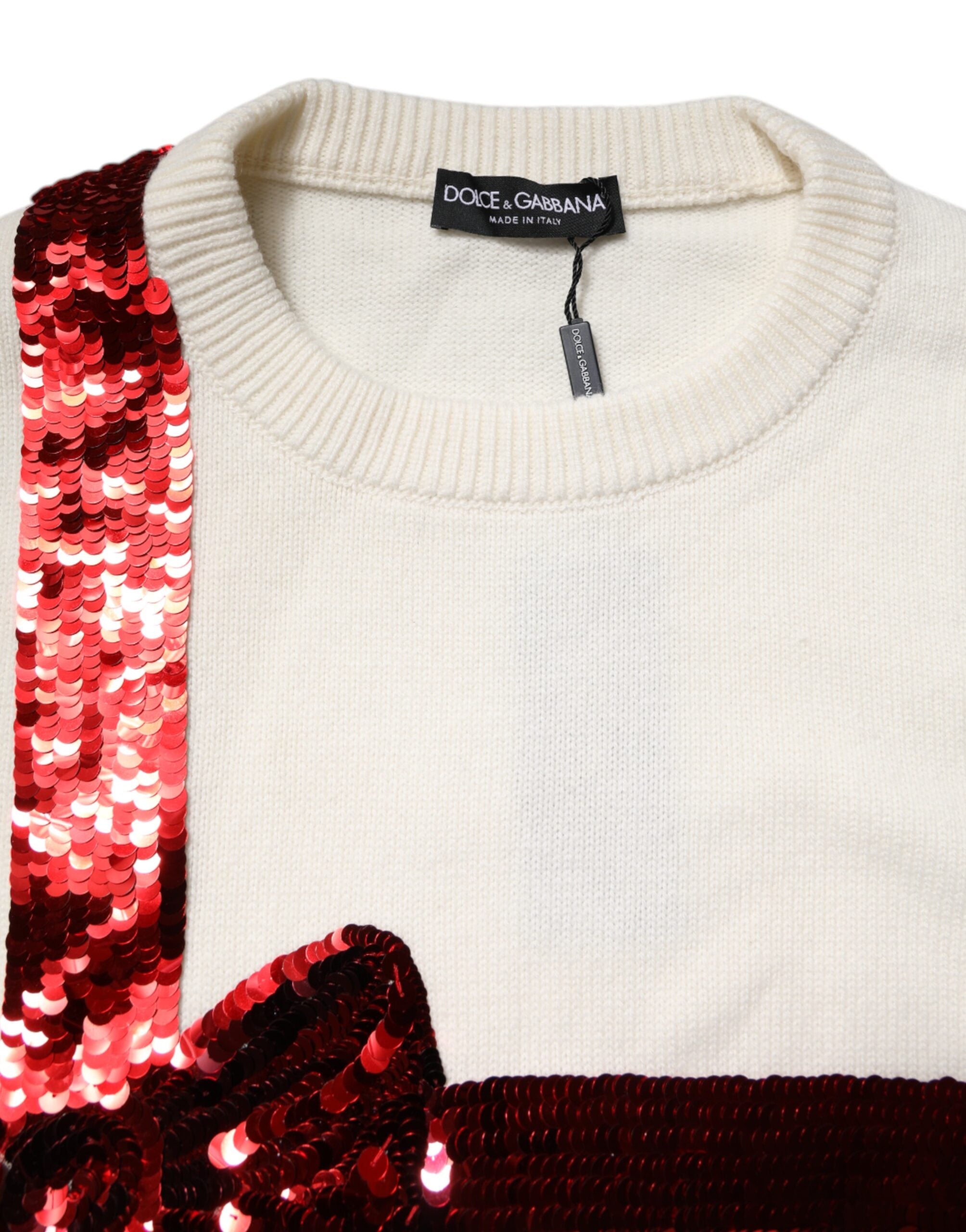 Pull-over blanc Dolce & Gabbana à sequins avec col rond, détail brillant et élégant, parfait pour une tenue chic.