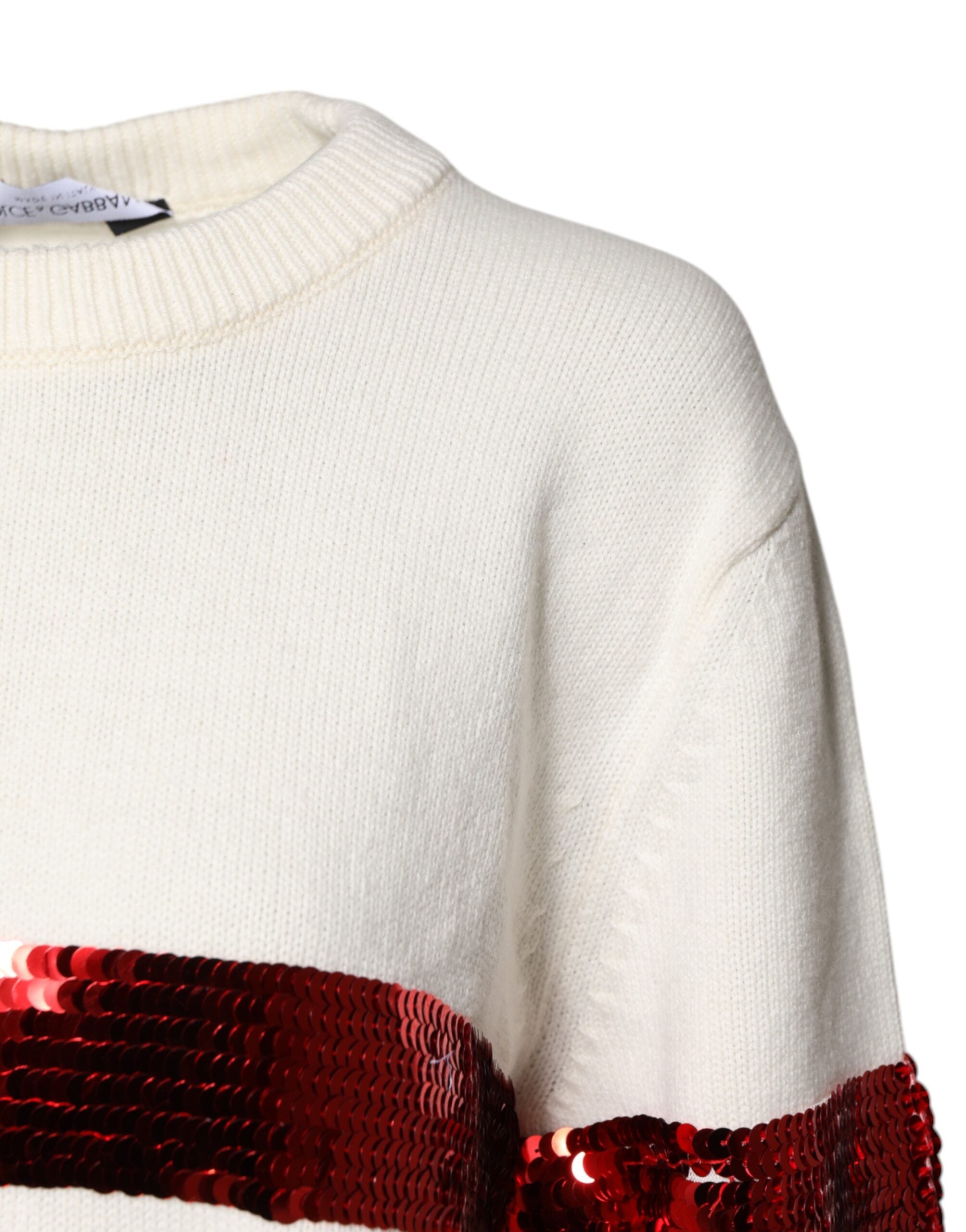 Pull en coton blanc Dolce & Gabbana à sequins avec col rond, détails brillants et style élégant.