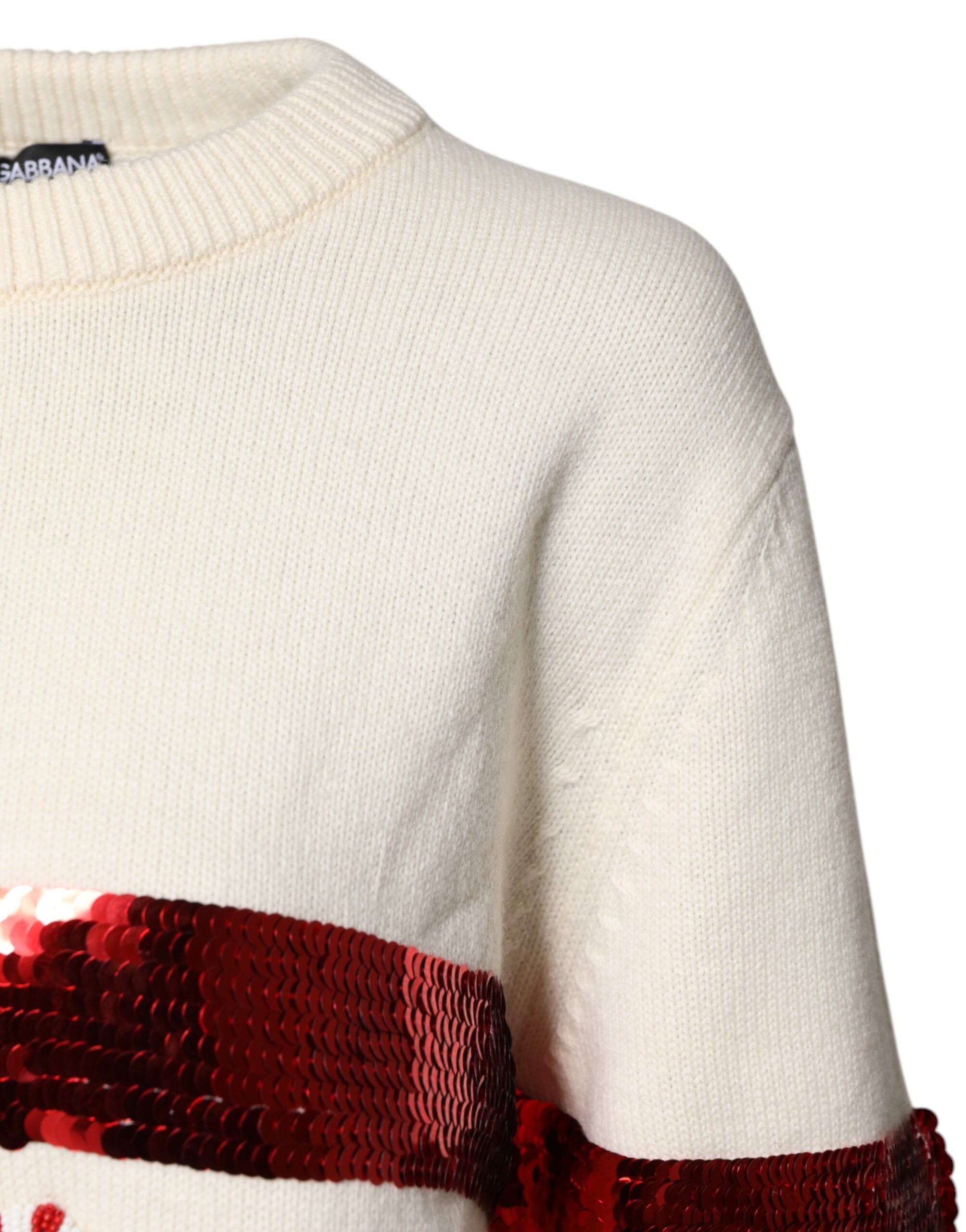 Pull en cachemire blanc Dolce & Gabbana avec sequins, col rond, design élégant et brillant, pour un look sophistiqué.