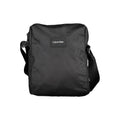 Sac à bandoulière pour homme en polyester noir de la marque Calvin Klein, avec poches et design épuré.