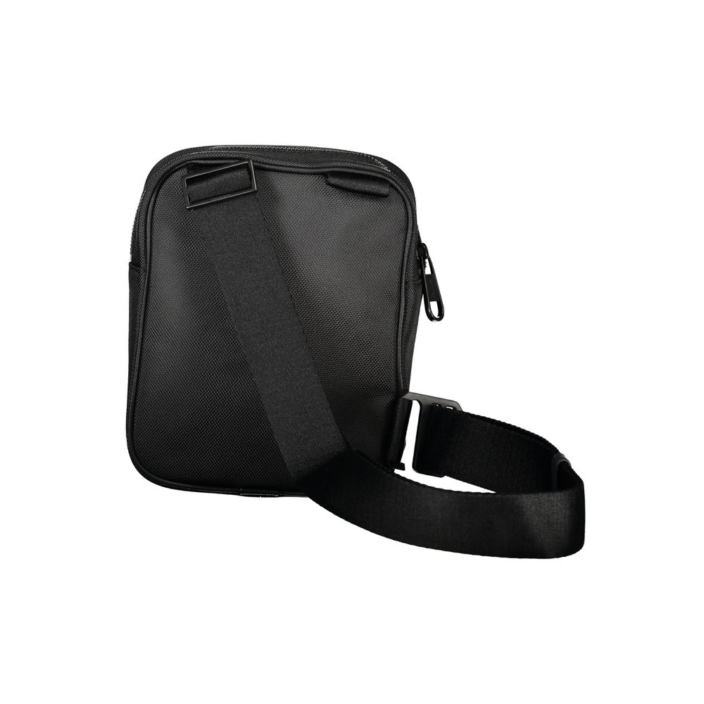 Sacoche homme en polyester noir de Calvin Klein, sac à épaule élégant avec logo sur le devant.