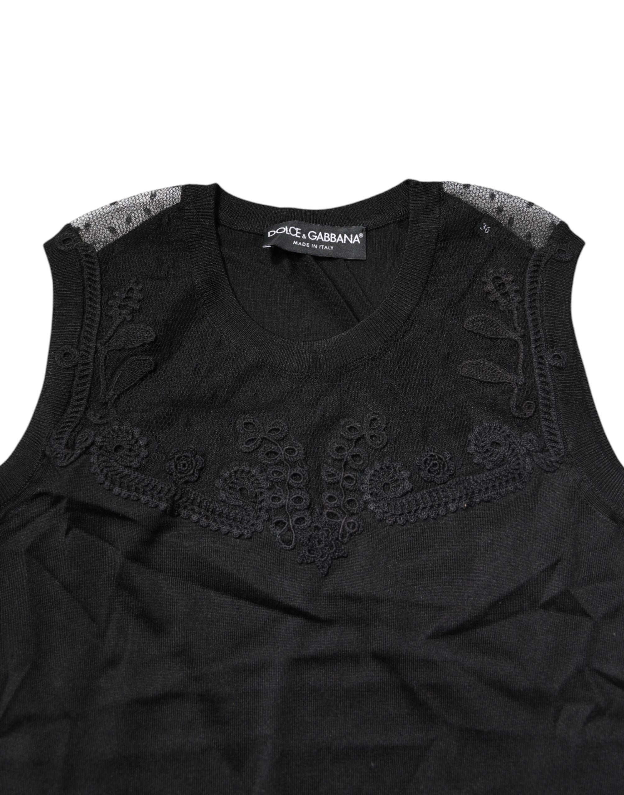 Haut sans manches en dentelle noire Dolce & Gabbana avec col rond transparent, style élégant et féminin.