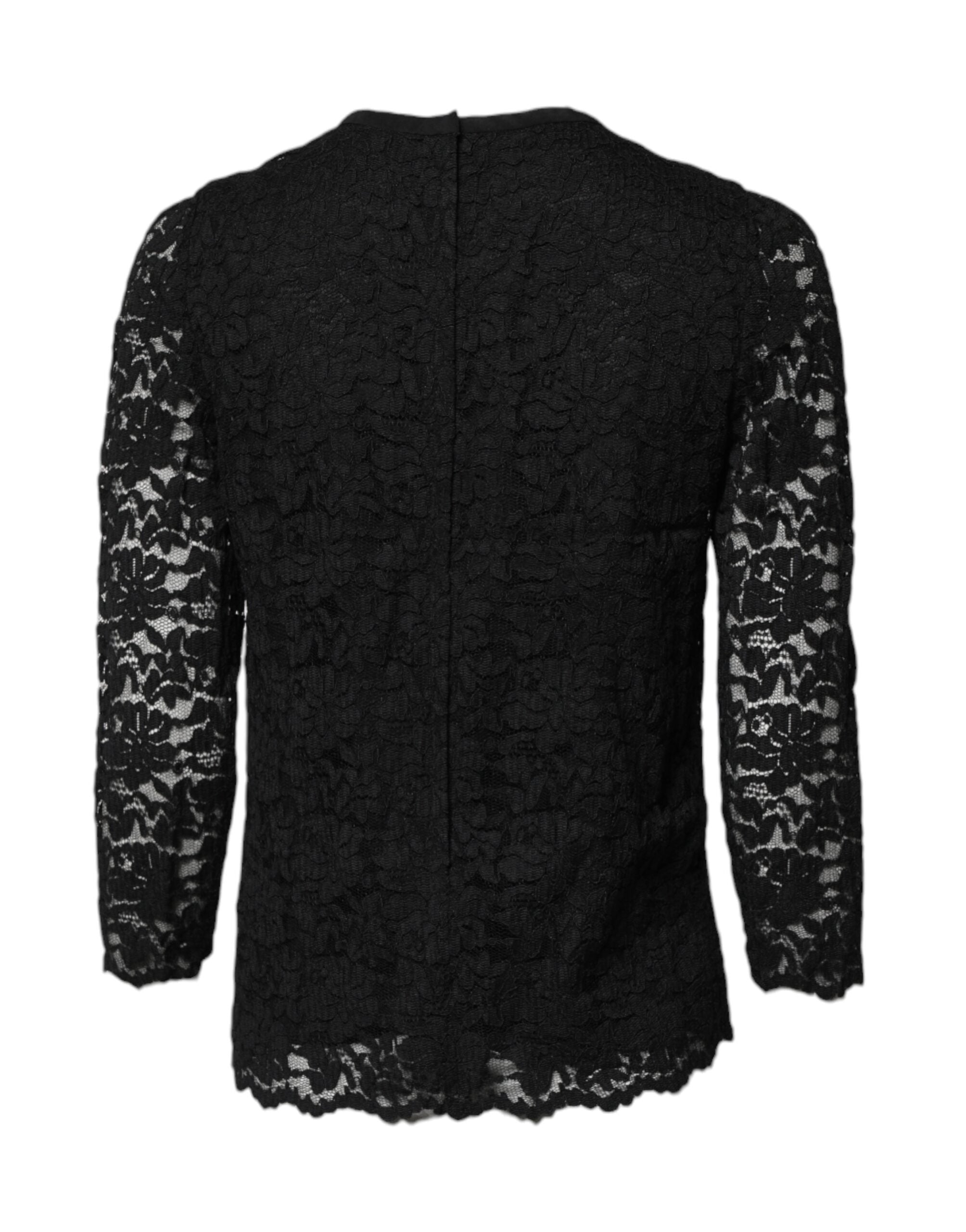 Haut à manches longues en dentelle noire Dolce & Gabbana avec col rond, style élégant et féminin.