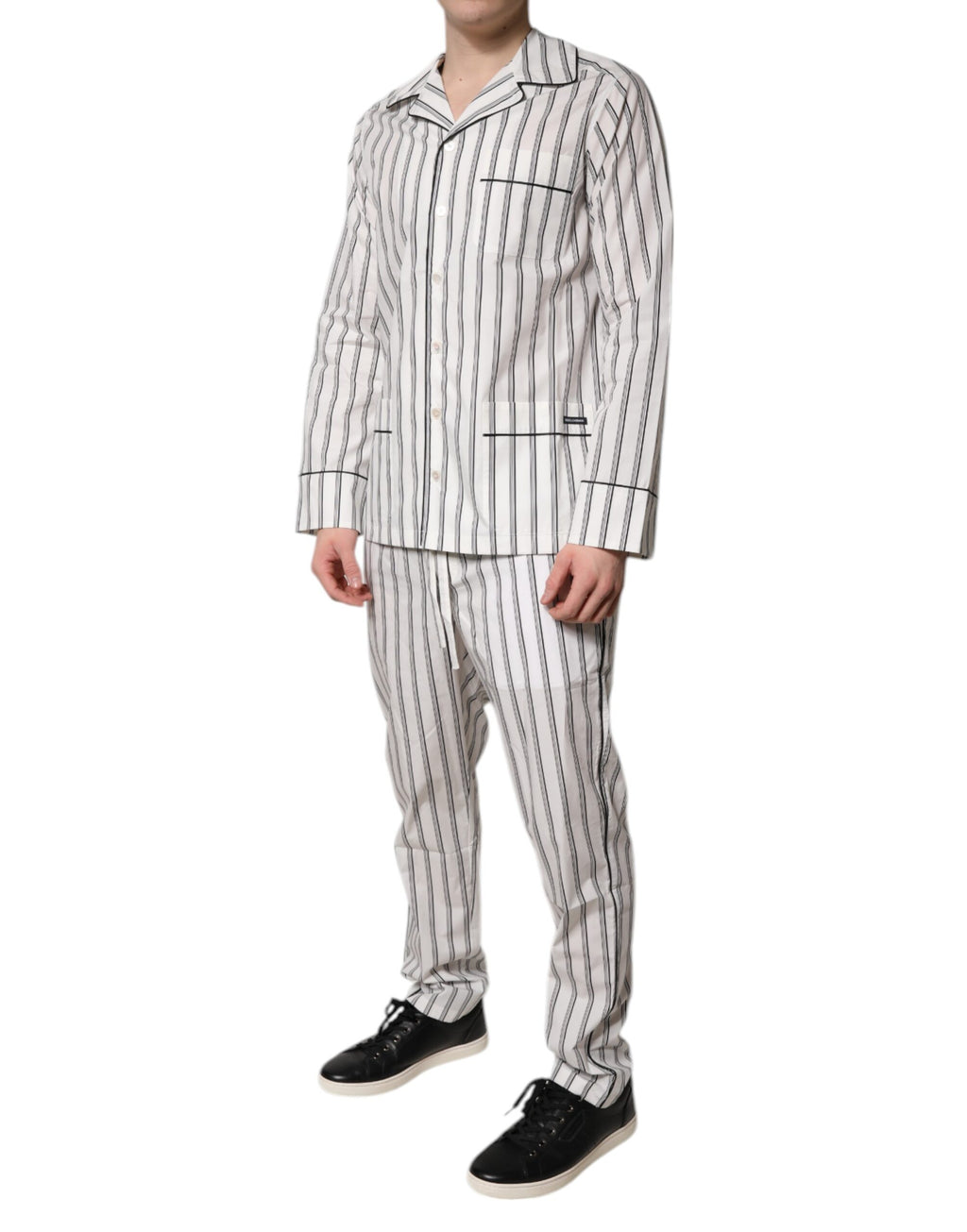 Pyjama homme Dolce & Gabbana en coton blanc avec rayures noires, ensemble de sommeil élégant et confortable.
