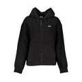 Sweat-shirt noir en coton pour femmes Tommy Hilfiger avec logo blanc, manches longues et coupe décontractée.