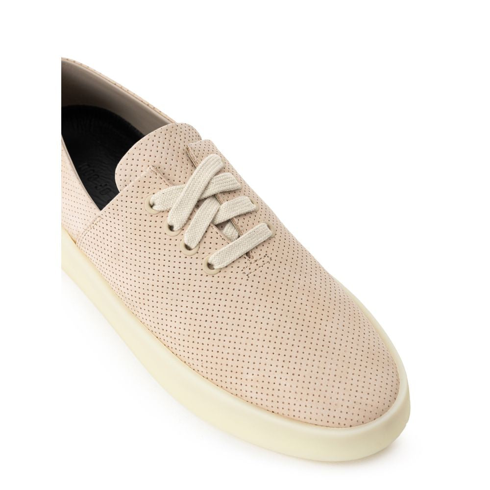 Basket en cuir beige Fear Of God, chaussures basses à semelle plate et design épuré, pour un style décontracté et élégant.