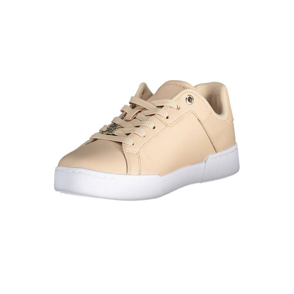 Sneakers en cuir rose pour femmes de la marque Tommy Hilfiger, design moderne et confortable, vue de côté.