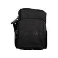Sac à bandoulière en nylon noir de Calvin Klein pour homme, avec poches et détails modernes.